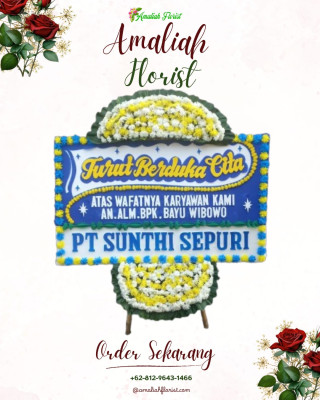 Papan Bunga Duka di Woniki