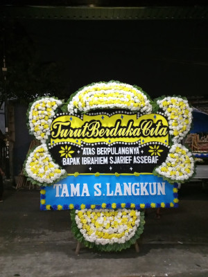Papan Bunga Duka di Woniki